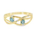 ANILLO 18KT 5 BR 2 TOPACIOS