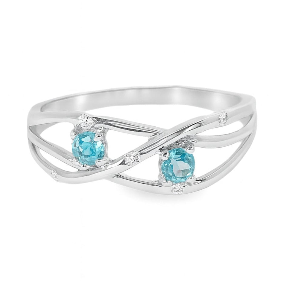 ANILLO 18KT 5 BR 2 TOPACIOS