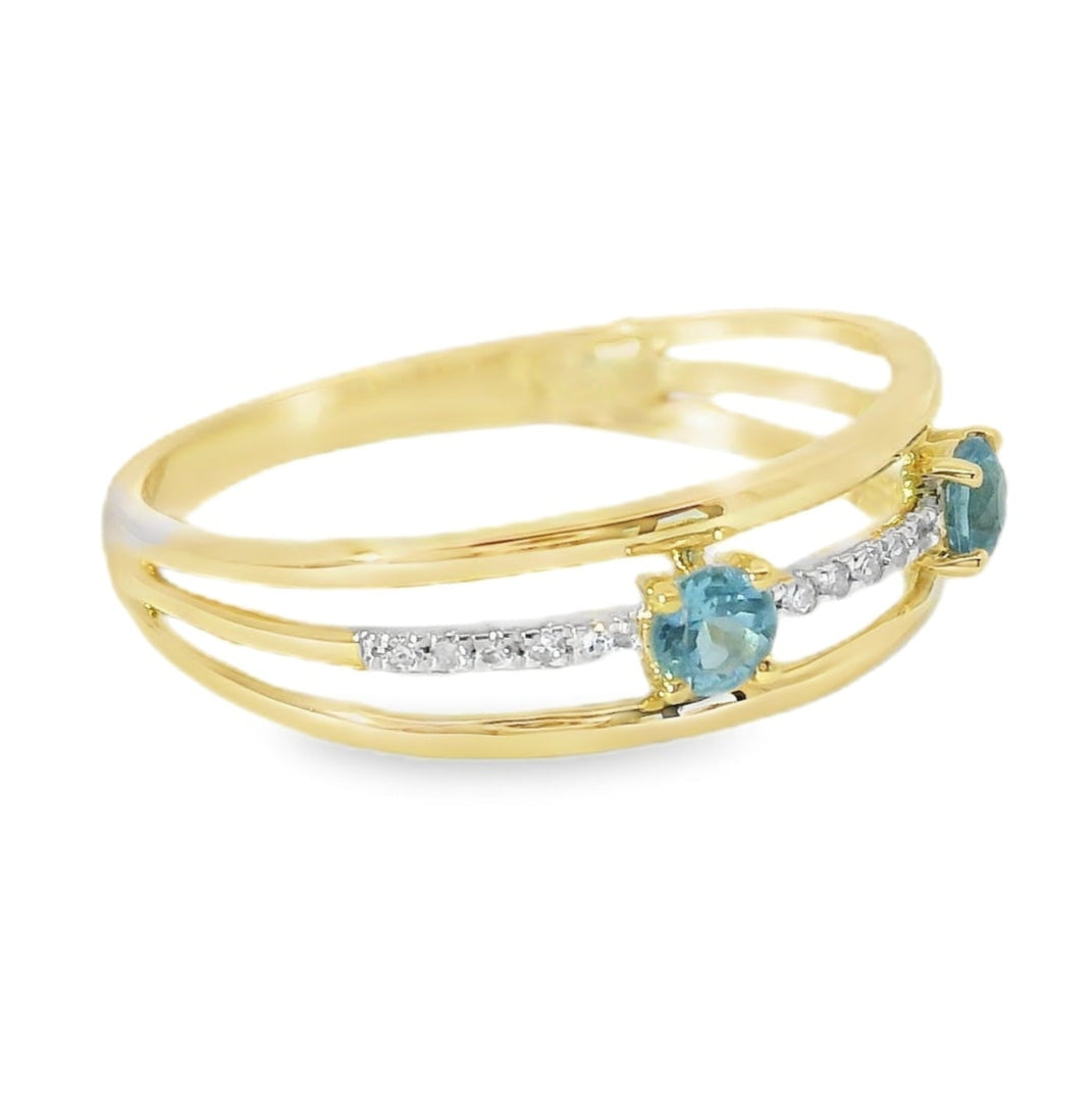 ANILLO 18KT 15 BRILLANTES 2 TOPAZIOS